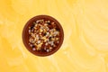 Garlic and chili seasoning in a small clay bowl top view