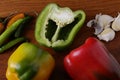 Garlic,chillies and red peppers on a wooden board for seasoning food