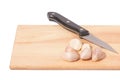 Garlic on the chopping block Royalty Free Stock Photo
