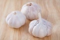 Garlic on the chopping block Royalty Free Stock Photo