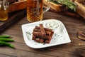 Garlic croutons bread beer snack with sour cream Royalty Free Stock Photo