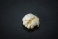 Garlic on a dark stone background vegatarian health fruit vegetables dark stone background Royalty Free Stock Photo