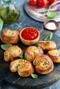 Garlic dinner rolls with marinara sauce