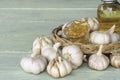 Garlic extract capsules oil in glass Royalty Free Stock Photo