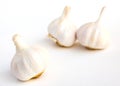 garlic heads and cloves on white background Royalty Free Stock Photo