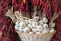 Garlic heads and red chili at market stall