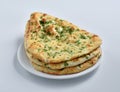 Garlic Nan, A delicious Indian flat bread baked in clay oven