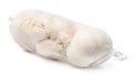 Garlic in net packaging on a white isolated background. Close-up. Side view. Royalty Free Stock Photo