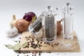 Garlic, onions, glass mill with pepper and salt on Royalty Free Stock Photo