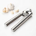Garlic press tool on white background Royalty Free Stock Photo