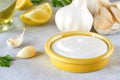 Garlic sauce with ingredients. Traditional middle eastern sauce toum. Closeup