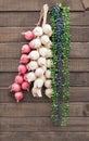 Garlic Shallot and Pepper hanging on wooden wall