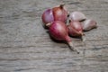 Garlic and shallots for cooking Put on the wood floor in the ki Royalty Free Stock Photo