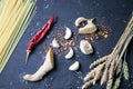 Garlic, species and ginger on a black background. Food ingredients. Cooking concept.Food photo. Fresh natural garlic on black Royalty Free Stock Photo