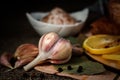 Garlic, spices and lemons are ingredients for salting and marinating meat. Head of garlic