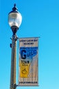 Garlic Town USA flag poster on retro street lamp