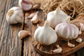 Garlic whole and sliced on a wooden table. Antibacterial, boosts immunity