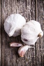 Garlic on a wooden background. Royalty Free Stock Photo