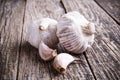 Garlic on a wooden background. Royalty Free Stock Photo