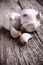 Garlic on a wooden background. Royalty Free Stock Photo