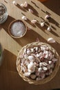 Garlics, salt and pepper on a table in kitchen Royalty Free Stock Photo