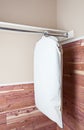 Garment bag hanging in cedar closet Royalty Free Stock Photo