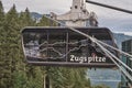 Side view of the cabin of the cable car to the summit of the Zugspitze, the longest cable car in the world with a column