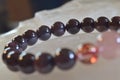 garnet beads bracelet with Hematoid In Quartz and strawberry quartz. Royalty Free Stock Photo