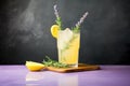 garnished glass of lemonade with a sprig of lavender
