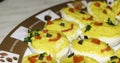 Garnished stuffed eggs close-up