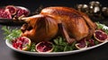 Garnished traditional roasted turkey with fresh figs, pomegranate, and herbs
