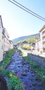 Garona River as it passes through Vielha, Valle de Aran, Lleida Royalty Free Stock Photo