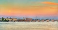 The Garonne river with the Pont de Pierre bridge and the Moon in Bordeaux, France