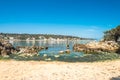 Garoupe sand beach and snowy mountains Antibes, France