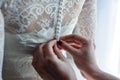 Garter on the leg of a bride, Wedding day moments Royalty Free Stock Photo