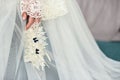 Garter on the leg of a bride, Wedding day moments Royalty Free Stock Photo