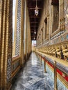 Garuda captures the Naga statue lined around the outer wall base Around the ubosot of Wat Phra Kaew,