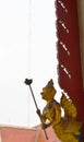 Garuda hold torch in Buddhist temple