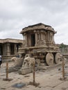 Garuda shrine in the form of a stone chariot in the courtyard of Vitthala temple at Hampi