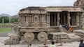 Garuda shrine in the form of a stone chariot in the courtyard of Vitthala temple at Hampi Royalty Free Stock Photo