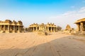 Garuda stone chariot and Vitthala temple gopuram, Hampi Royalty Free Stock Photo