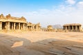 Garuda stone chariot and Vitthala temple gopuram, Hampi Royalty Free Stock Photo