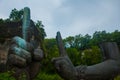 Garuda Wisnu Kencana Cultural Park. Huge hands of a statue of Vishnu. Bali. Indonesia.