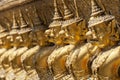 Garudas and nagas on external decorations of the Ubosoth, Wat Phra Kaew temple, Grand Palace, Bangkok, Thailand Royalty Free Stock Photo