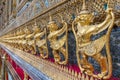 Garudas and nagas on external decorations of the Ubosoth, Wat Phra Kaew temple, Grand Palace, Bangkok, Thailand Royalty Free Stock Photo