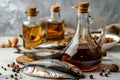 Garum fish sauce in a decanter on the table with fresh sardines and spices.