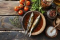 Garum fish sauce in a deep bowl with spices and tomatoes on a wooden table.