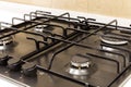 Gas burner on black modern kitchen stove Royalty Free Stock Photo