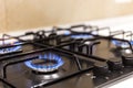 Gas burner on black modern kitchen stove Royalty Free Stock Photo
