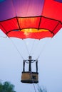 Gas burner blowing up hot air balloon. Slow motion scene of flames rising and inflating hot air balloons. Preparing for a balloon Royalty Free Stock Photo